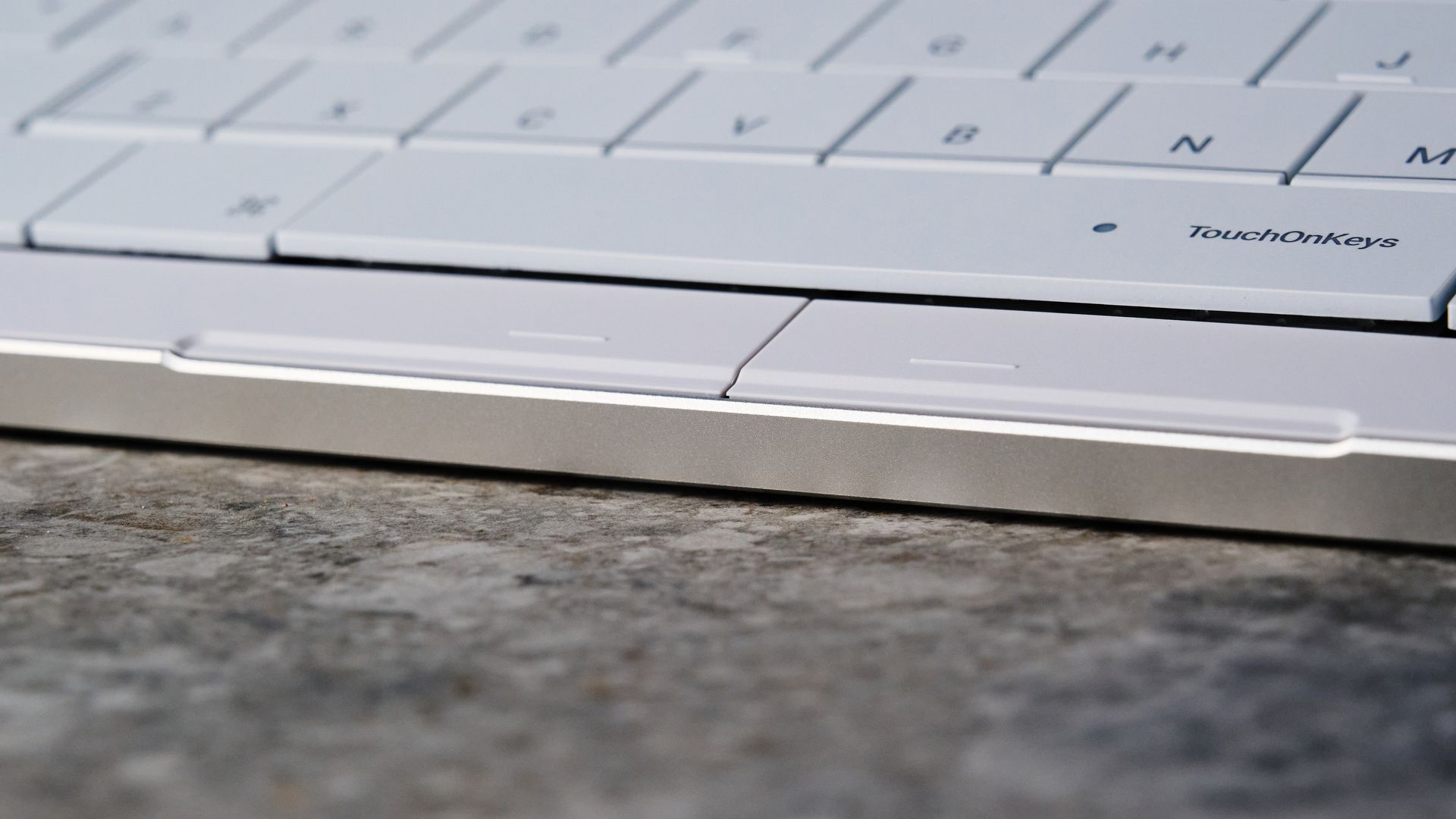 A white Clevetura CLVX S keyboard