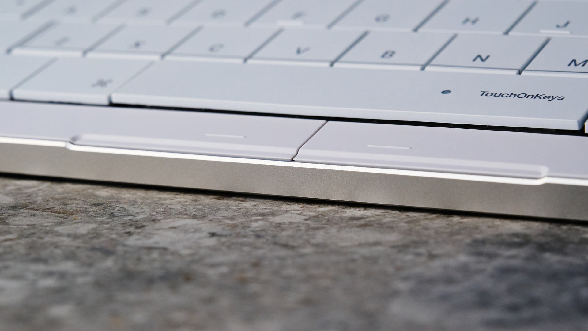 A white Clevetura CLVX S keyboard