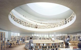 A bookstore with a central round skylight illuminating the book lined walls below.
