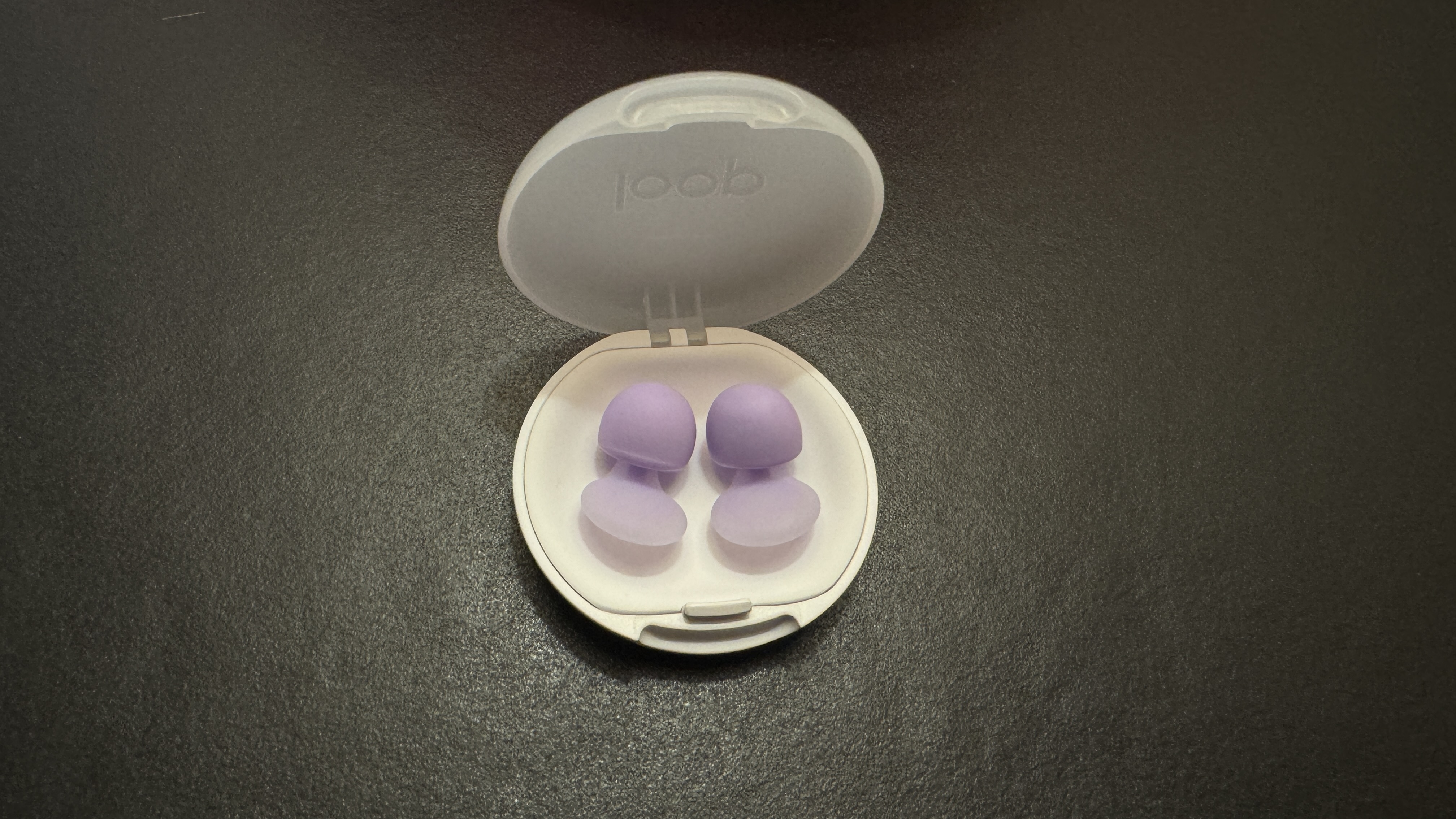 Loop Dream earbuds on a desk