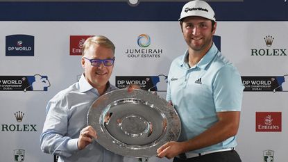 Keith Pelley hands Jon Rahm the Sir Henry Cotton Rookie of the Year award in 2017