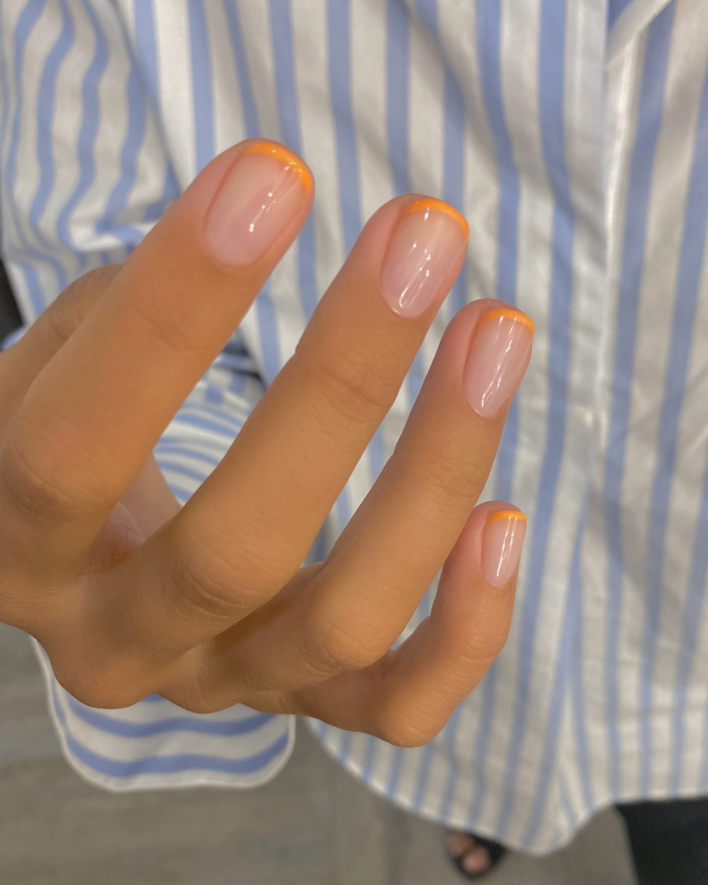 @harrietwestmoreland orange French tip nails