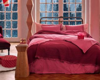 Pink and red striped bedding set from H&M in grotto room