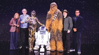 Chewbacca, C-3PO, R2-D2 join Dave Filoni and others on stage at CES to introduce the new LEGO Smart Brick. 