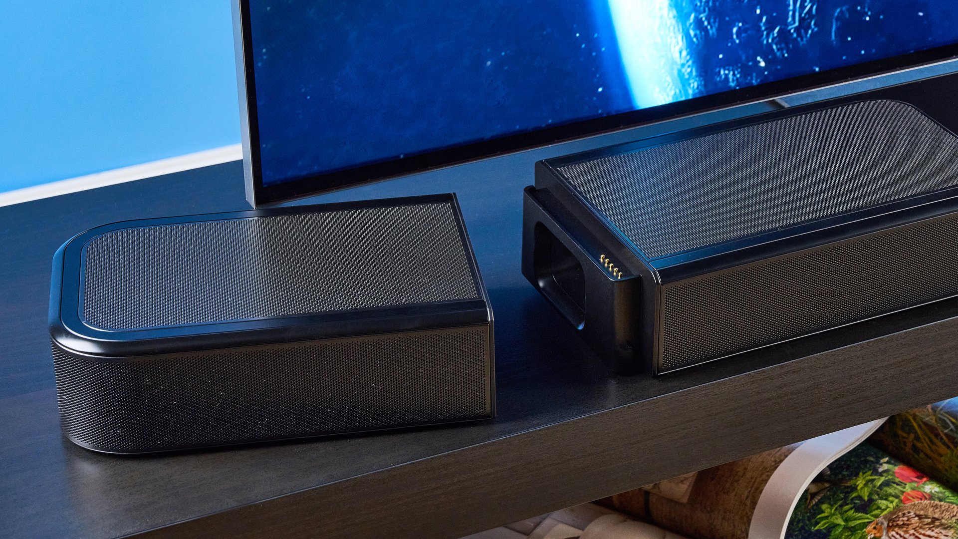 the jbl bar 1300xmk2 in black photographed against the blue tom's guide background