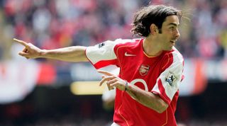 CARDIFF, UNITED KINGDOM - APRIL 16: Robert Pires of Arsenal celebrates scoring the opening goal during the FA Cup Semi-Final match between Arsenal and Blackburn Rovers at the Millennium Stadium on April 16, 2005 in Cardiff, Wales. (Photo by Mike Hewitt/Getty Images)