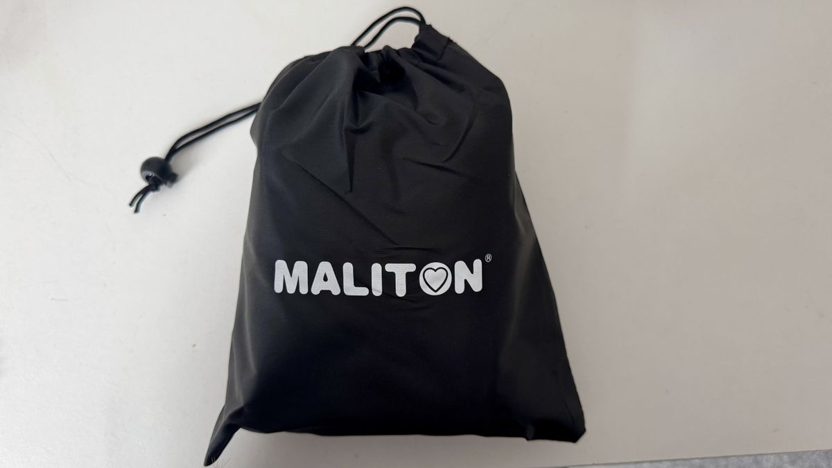The Maliton inflatable travel pillow packaged and inflated