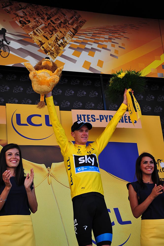 Chris Froome (Team Sky) wears the yellow jersey