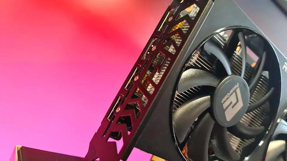 Видеокарта AMD Radeon RX 6600 на красочном фоне.