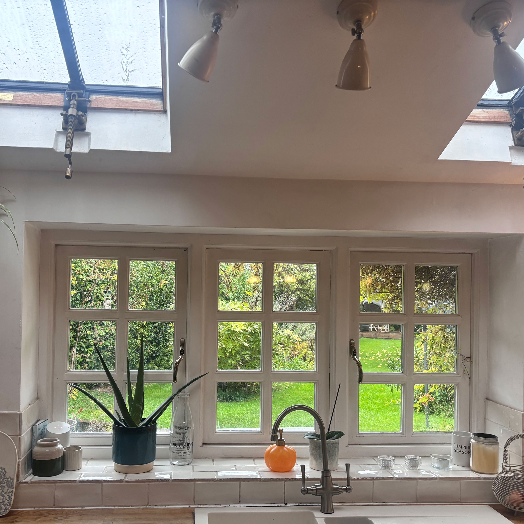 cottage style casement window with tiled window sill