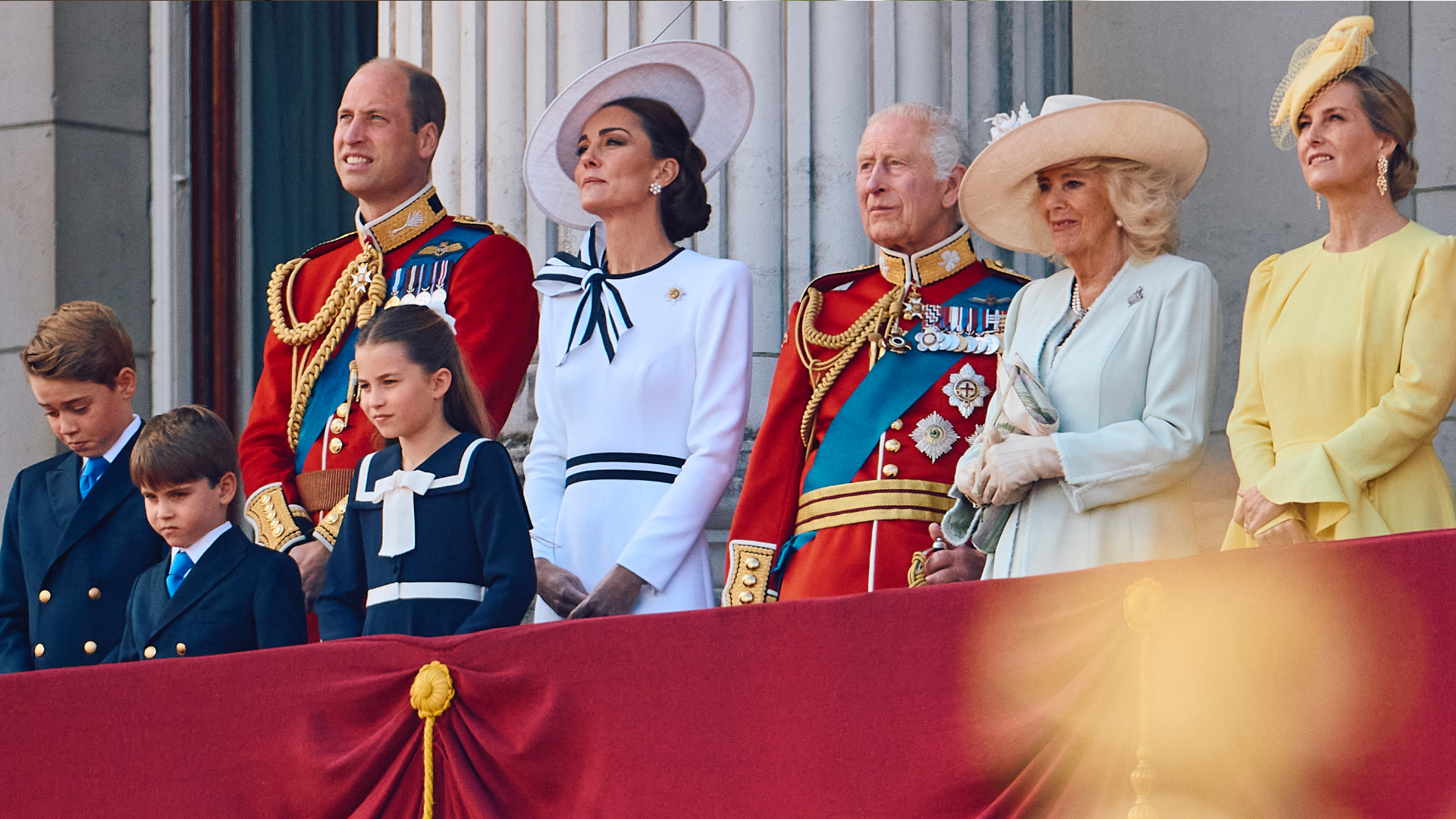 The Royal Family stands on the Buckingham Palace balcony