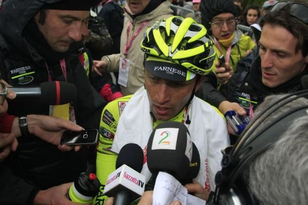 Matteo Rabottini (Farnese Vini-Selle Italia) is swamped by the press after his stage 15 win at the Giro d'Italia
