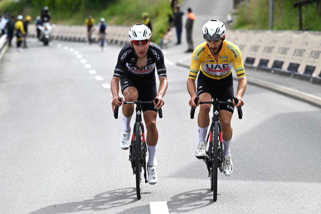 VILLARSSUROLLON SWITZERLAND JUNE 15 LR Joao Almeida of Portugal and UAE Team Emirates Black Points Jersey and Adam Yates of The United Kingdom and UAE Team Emirates Yellow Leader Jersey compete in the breakaway during the 87th Tour de Suisse 2024 Stage 7 a 1182km stage from VillarssurOllon to VillarssurOllon 1248m UCIWT on June 15 2024 in VillarssurOllon Switzerland Photo by Tim de WaeleGetty Images