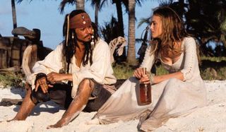 Pirates of the Caribbean: Curse of The Black Pearl Captain Jack and Elizabeth drink rum on the beach