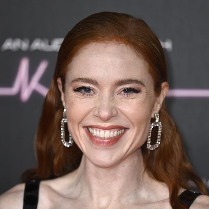 Angela Scanlon on red carpet with diamond earrings