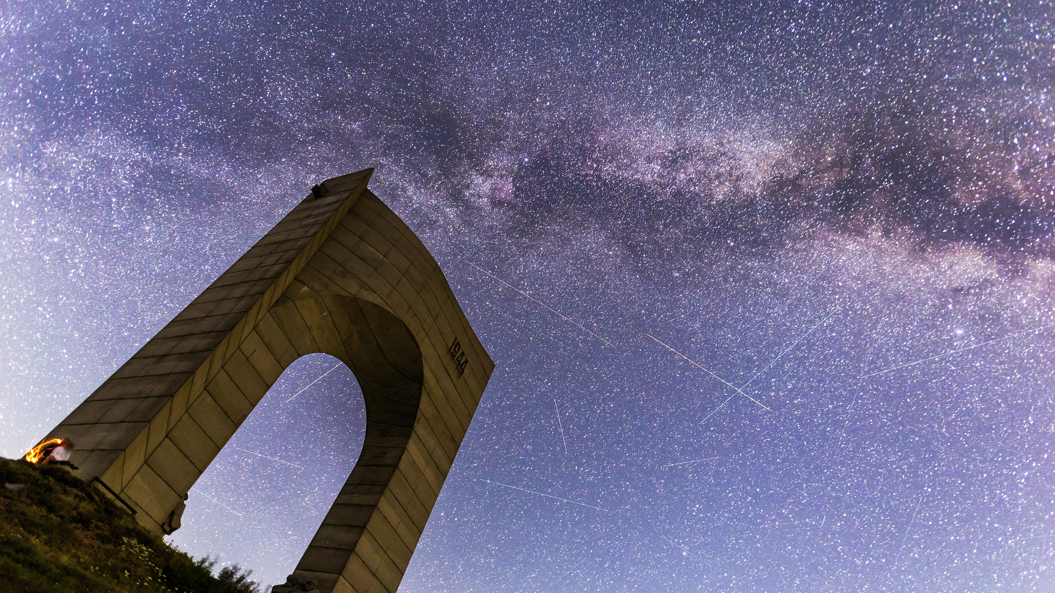 Perseid meteor shower with the Monument ''Arch Of Freedom'' in the foreground in Balkan Mountains, Bulgaria on 12 of August, 2026. (Photo by STR/NurPhoto via Getty Images)