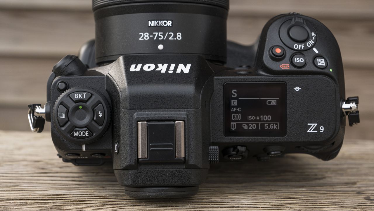 The Nikon Z9 camera on a wooden table
