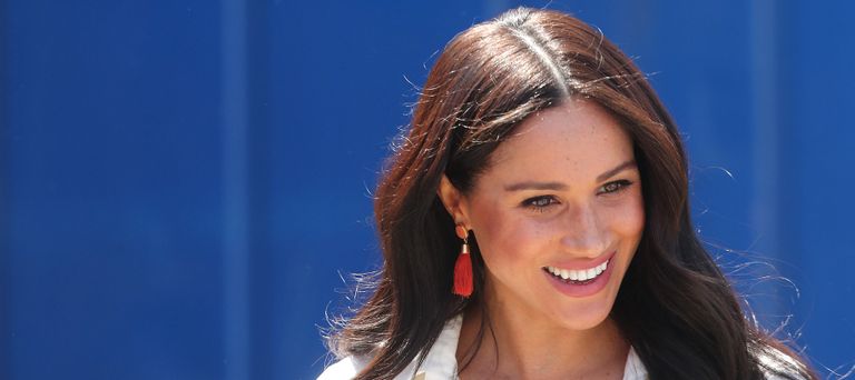 Meghan Markle, Duchess of Sussex visits a township with Prince Harry, Duke of Sussex to learn about Youth Employment Service