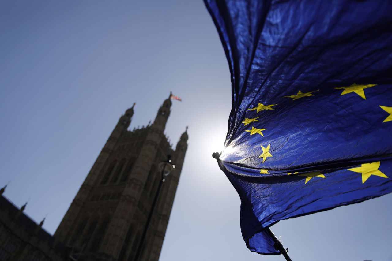 EU flag outside of Houses of Parliament in London