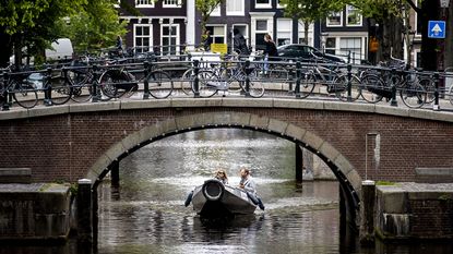 Canal in Amsterdam © KOEN VAN WEEL/ANP/AFP via Getty Images