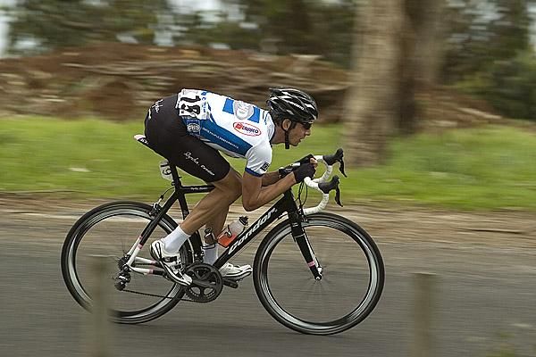 Darren Lapthorne (GHD-Burnie) assumes the tuck position on a descent during his breakaway attempt on stage three.
