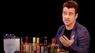 Colin Farrell taking on the spicy wings challenge on the internet talk show Hot Ones