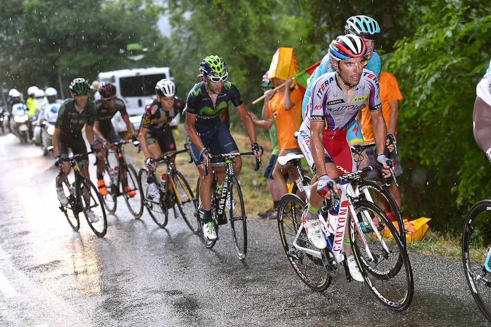 Joaquim Rodriguez in the group before attacking during stage 12.