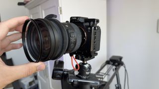 Installing the included rings from the Elgato Prompter onto a DSLR camera