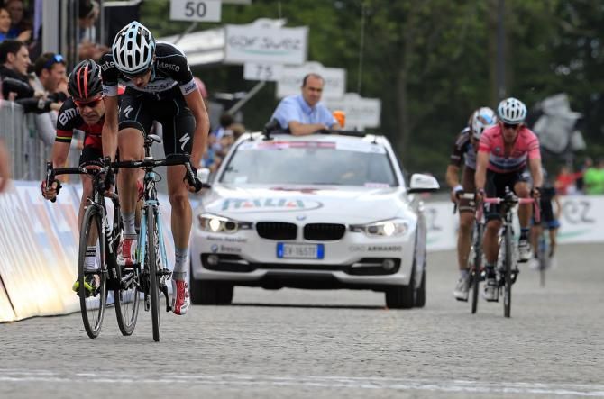 Wout Poels (Omega Pharma - QuickStep) leads home rival Cadel Evans