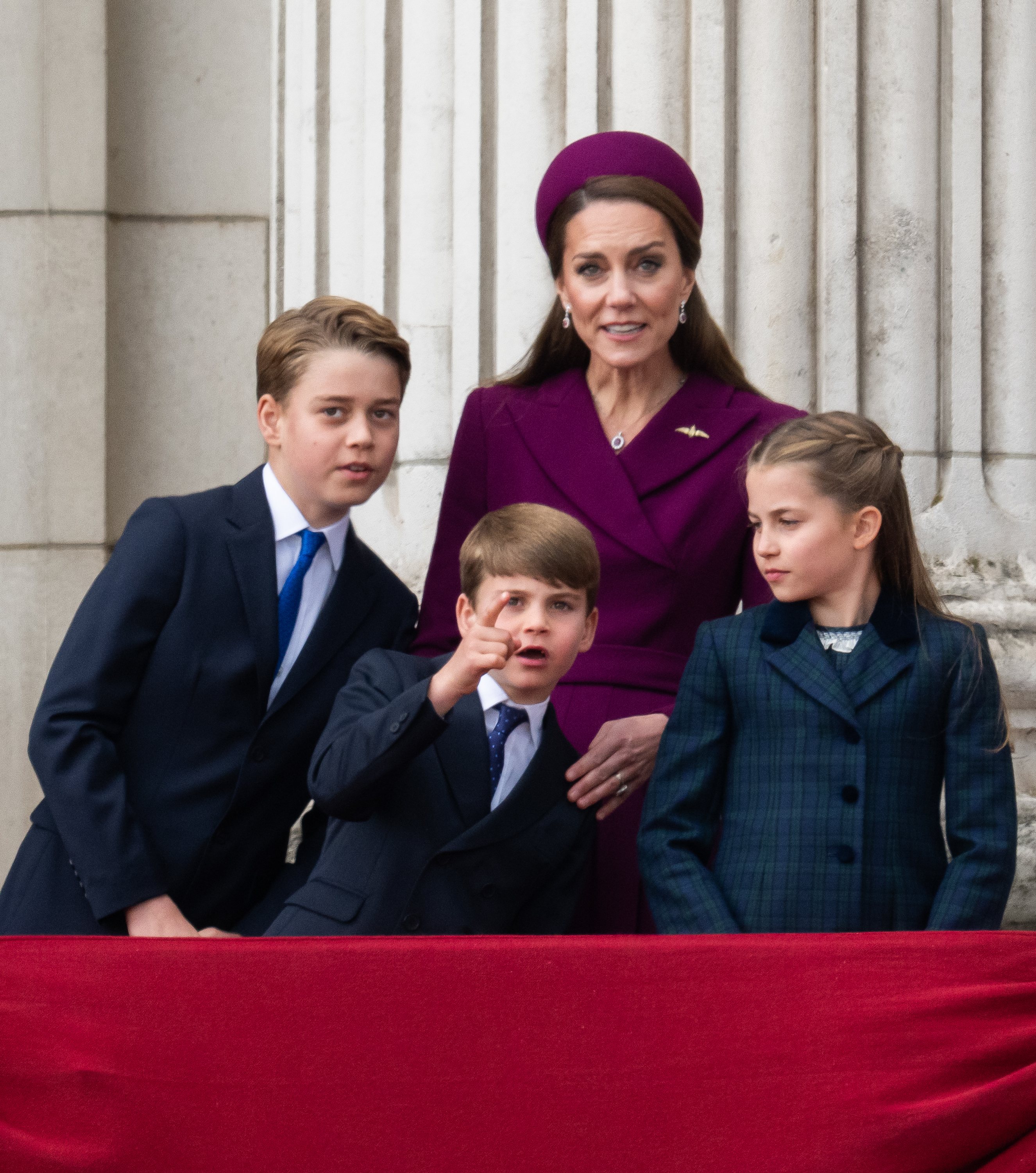 Prince George, Princess Kate, Prince Louis and Princess Charlotte on the balcony at the VE Day 80th anniversary