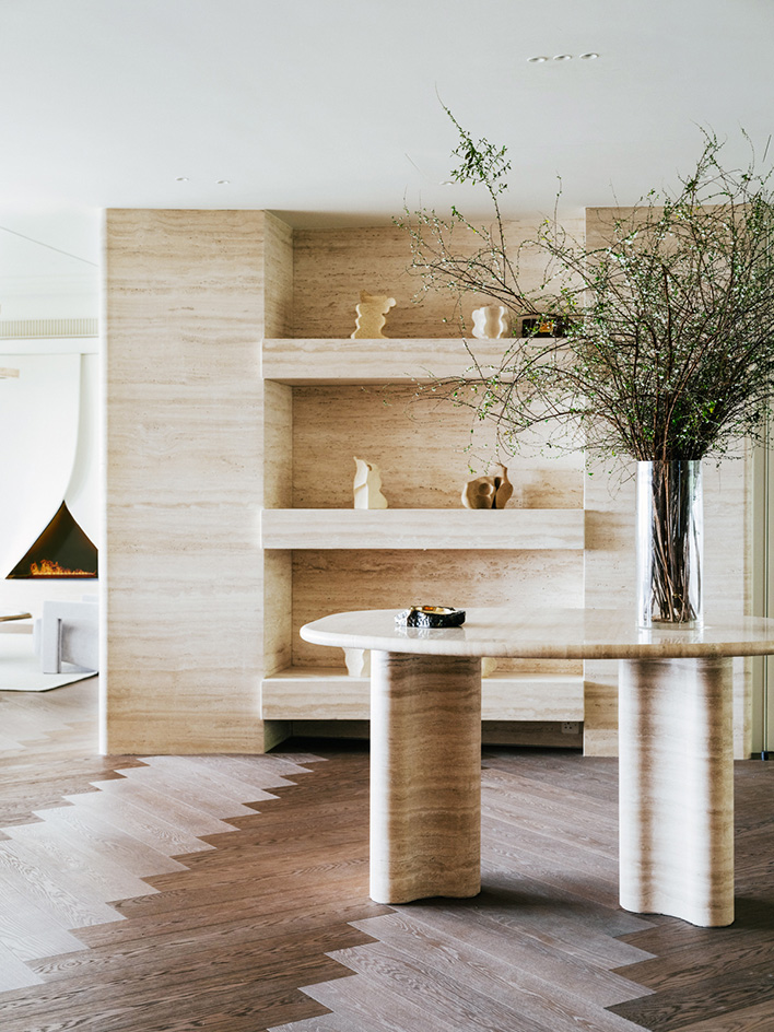Mountain Residence, the interior of a home composed in light neutral colours and sculptural design and art