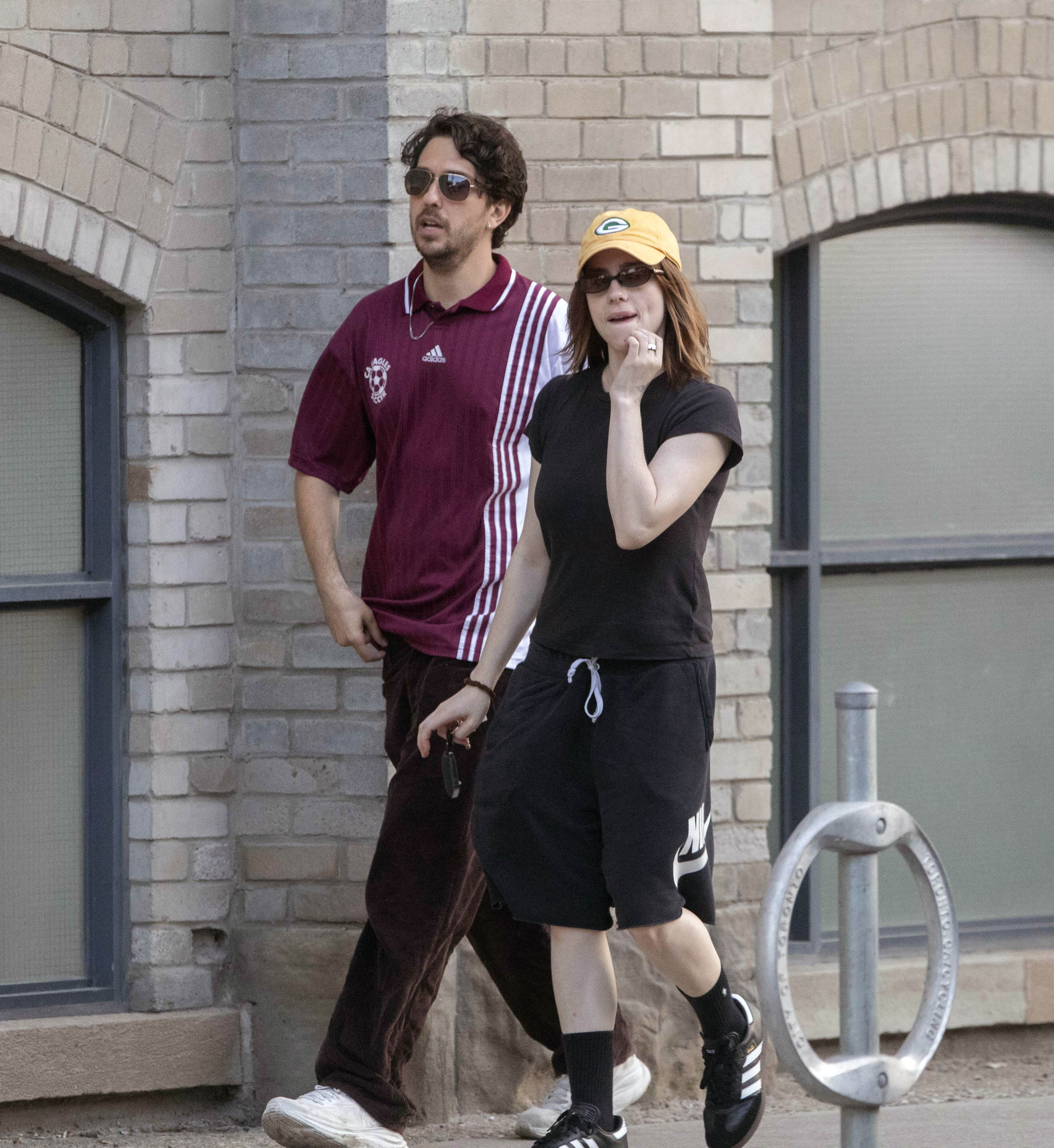 Billie Eilish wore the board shorts trend with Adidas Samba sneakers