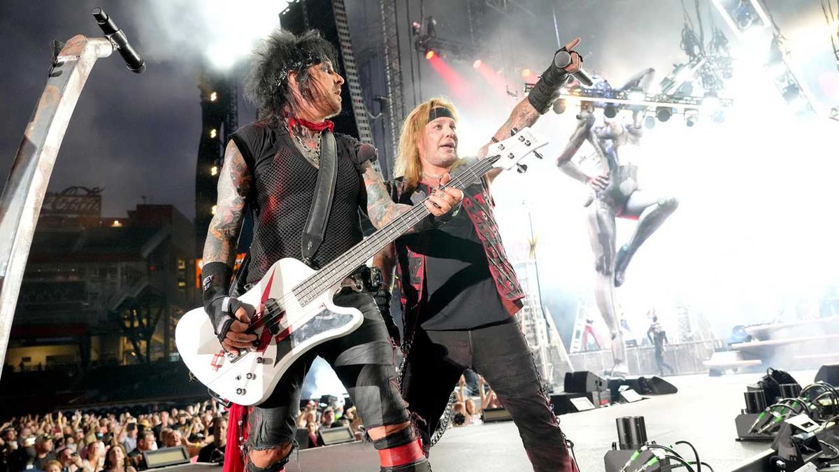 Nikki Sixx and Vince Neil onstage