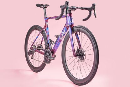 The Liv EnviLiv full bike front side on with a pink background 