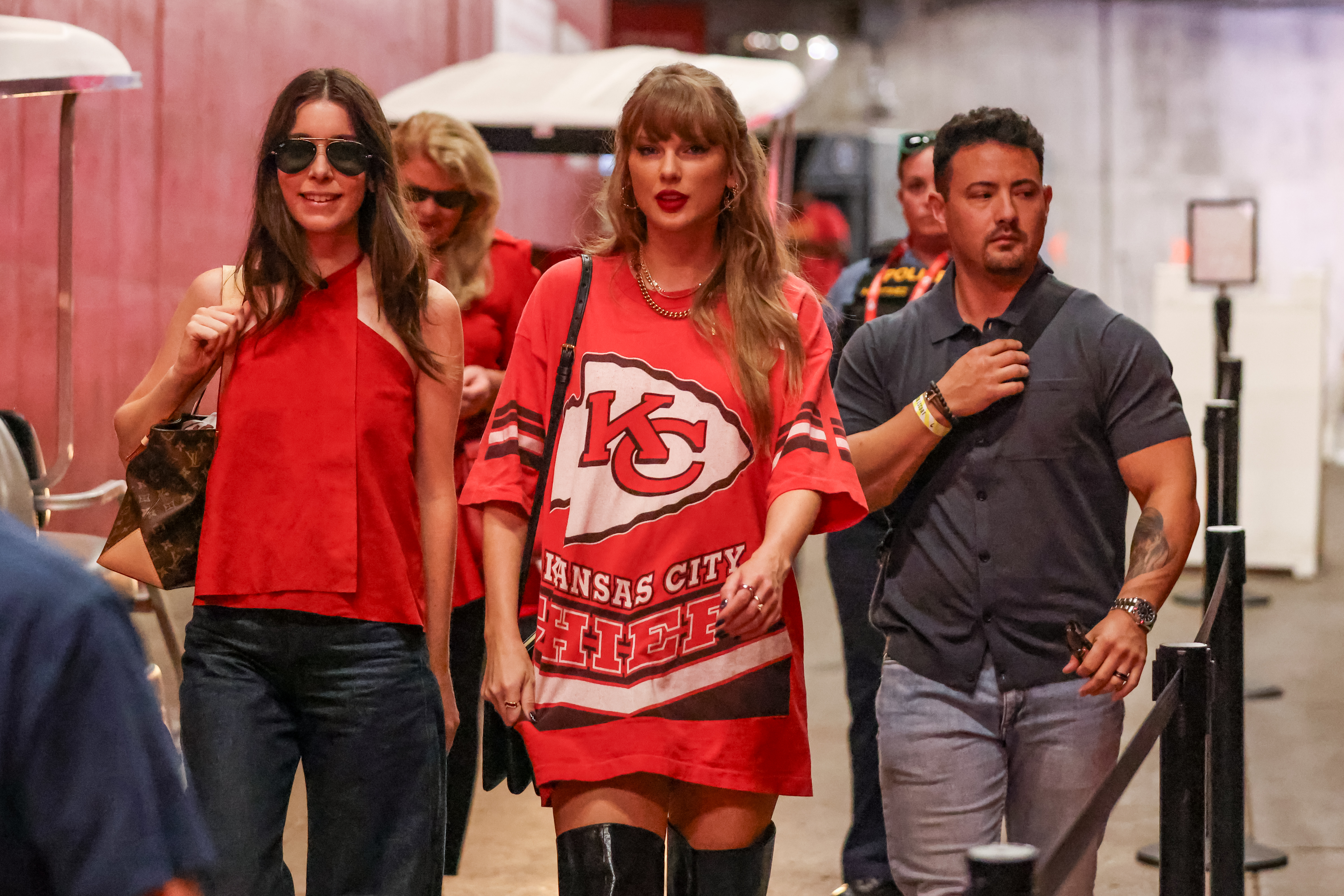 Taylor Swift at Arrowhead STadium wearing a vintage Kansas City Chiefs jersey