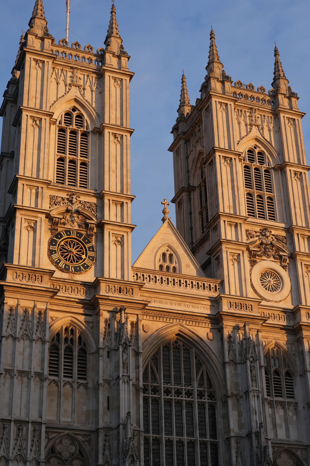 Sun setting against Westminster Abbey