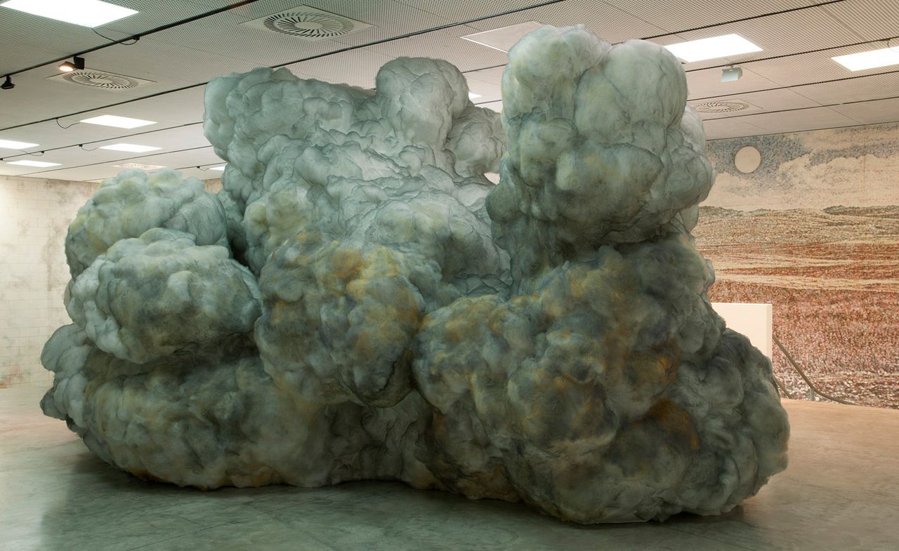 metallic wool, unravelled felt, pillow stuffing and mould created sculptures- Green cloud like