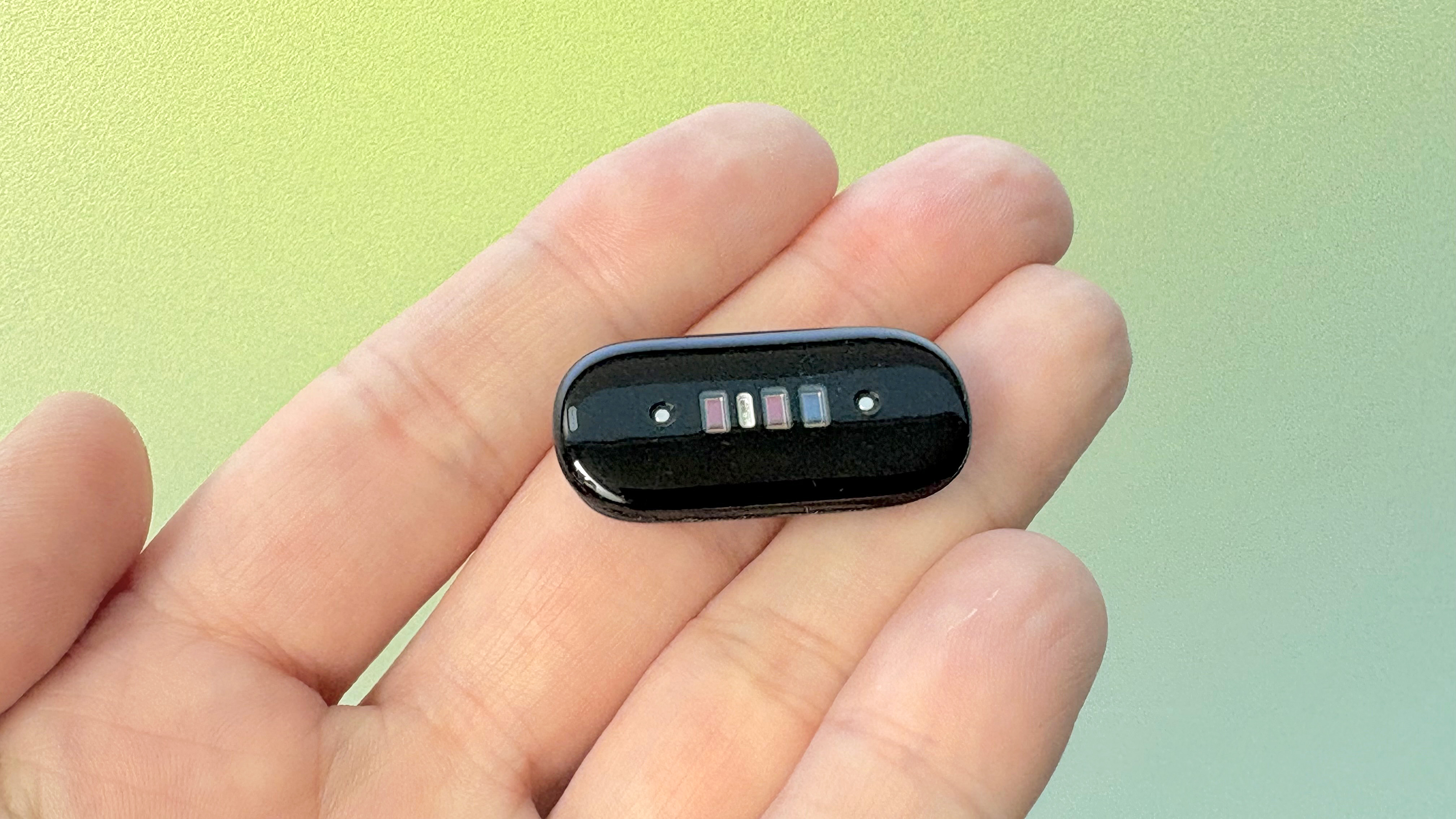 Hands-on with the Fitbit Air on the orange and brown Stephen Curry strap