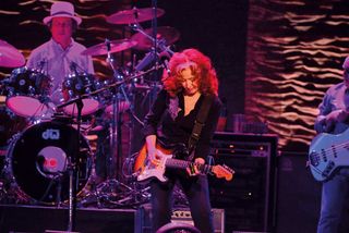 Ricky Fataar (Stig O’Hara from the Rutles!) [left] and Bonnie Raitt perform in the UK in June 2013.