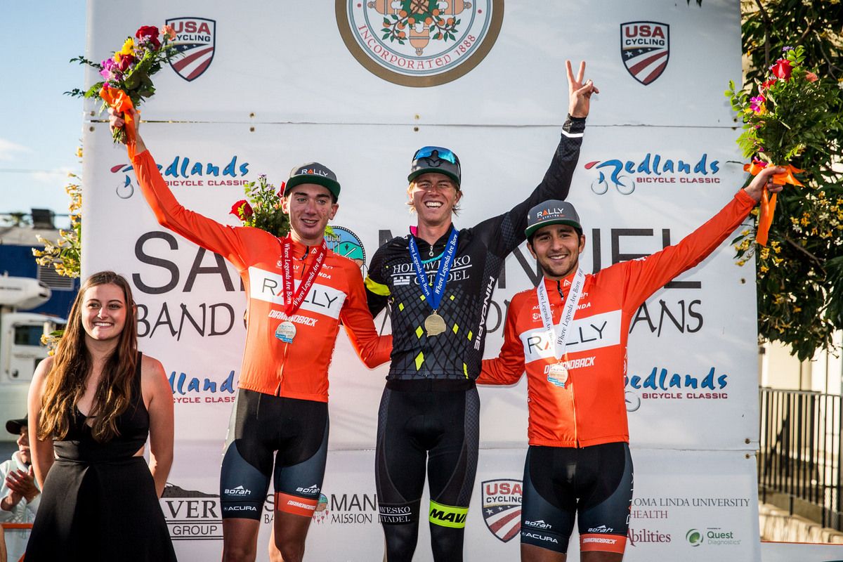 Overall winner Tj Eisenhart is flanked by Rally Cycling's Brandon McNulty and Brandon McNulty