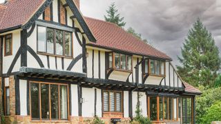 A tudor-style home with newly fitted windows