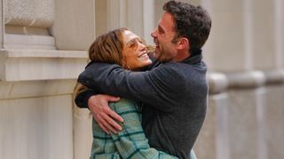Jennifer Lopez and Ben Affleck smile and laugh as they embrace