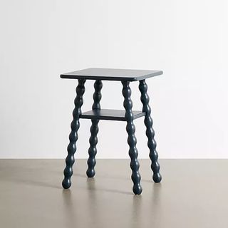 Urban Outfitters navy bobbin side table.