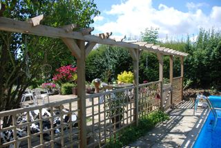 pergola ideas on top of fence from Jacksons fencing