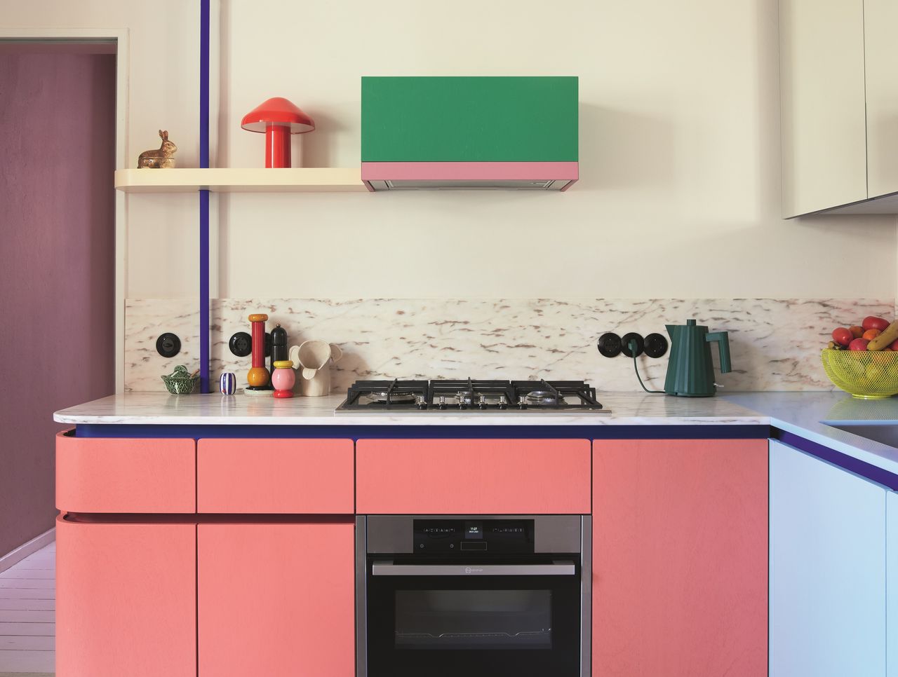 A neutral kitchen with pops of colorful paint