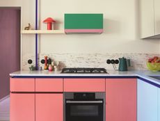 A neutral kitchen with pops of colorful paint