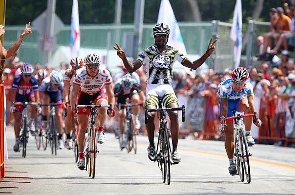 Bahati's sprint was so fast he had time to do several different salutes - here he counts his wins.