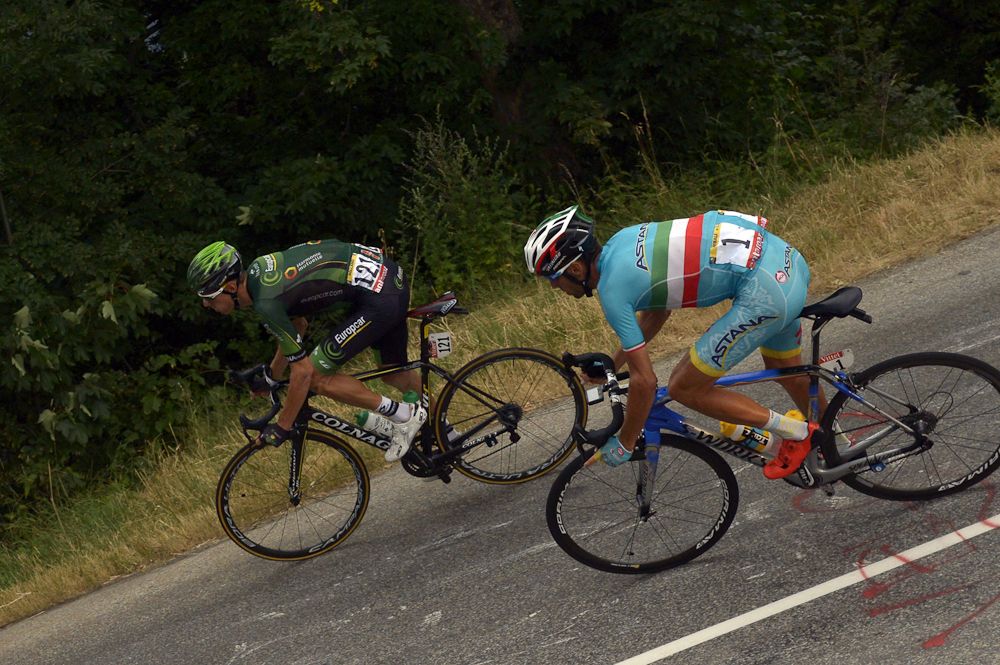Vincenzo Nibali catches Pierre Rolland during stage 19.