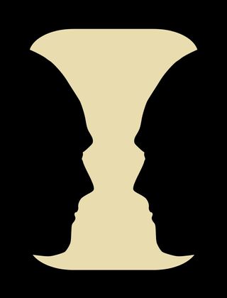 An illustration of a white vase also appears as the side profile of two faces depicted in black
