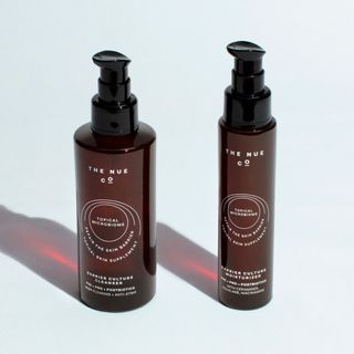 Nue Co.'s Barrier Culture in brown glass bottles is part of the minimalist skincare trend